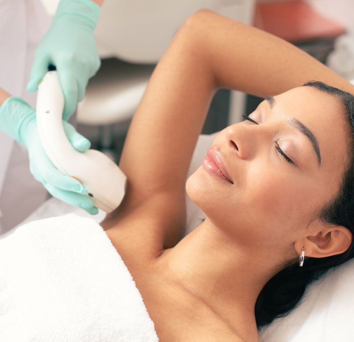 woman getting laser hair removal treatment at NuIQ med spa in Cleveland