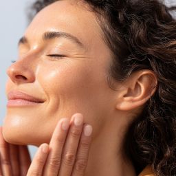 woman with firm, radiant, and youthful skin