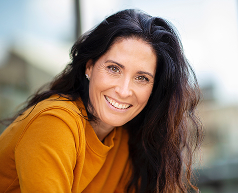 woman with full head of healthy hair as a results of hair transplant alternatives