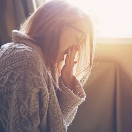 woman yawning from fatigue