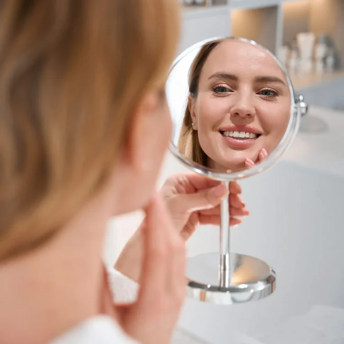 woman at med spa happy with botox treatment