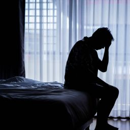 man struggling with poor sleep, potentially related to low testosterone