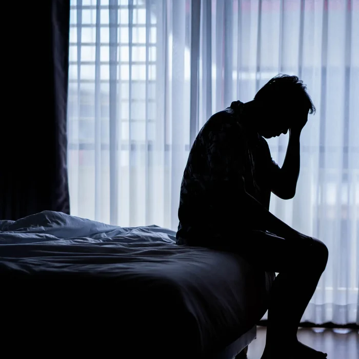 man struggling with poor sleep, potentially related to low testosterone