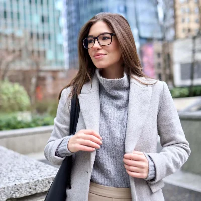 woman with beautiful skin after laser treatment for pigmentation walking in city